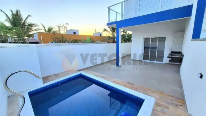 Sobrado com 3 dormitórios à venda, 113 m² por R$ 550.000,00 - Balneário dos Golfinhos - Ca