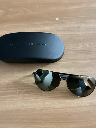 Óculos porsche design (preço de loja 1900) aceito iPhone 11/12 na troca 
