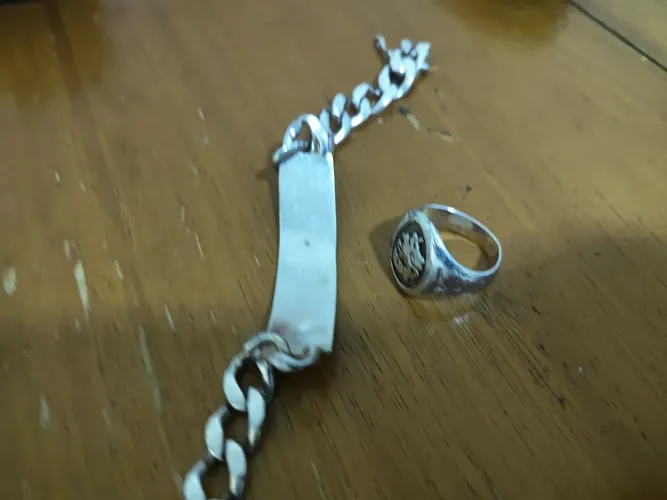 Pulseira de prata e anel do São Jorge