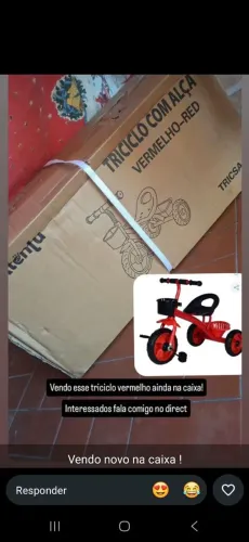 Vendo triciclo vermelho