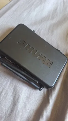 Microfone shure pg58 sem fio.