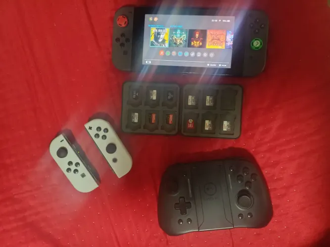 NINTENDO SWITCH 1 - V2 + CASE E CARTÕES DE MEMÓRIA