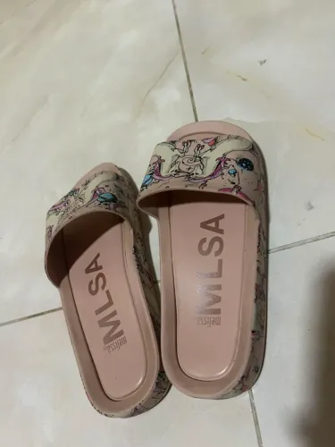Vende-se rasteira melissa tam:35