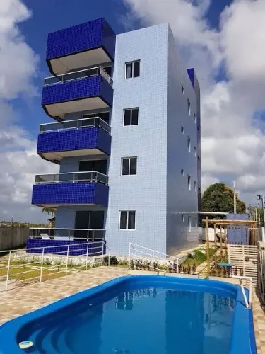 Apartamento com 2 dormitórios à venda, 65 m² por R$ 242.700,00 - Cidade Balneária Novo Mun