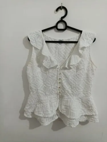 blusa/ bata da marca kal Laynne