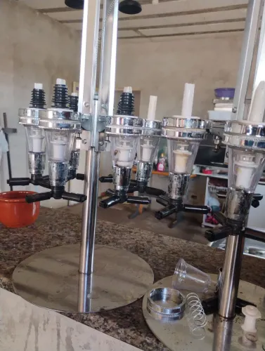 Suporte dosador de bebidas