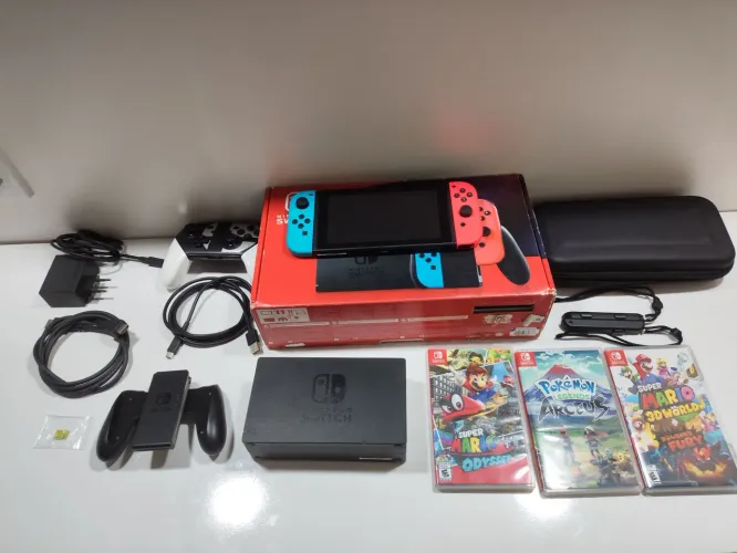 Nintendo Switch seminovo + 3 jogos e acessórios