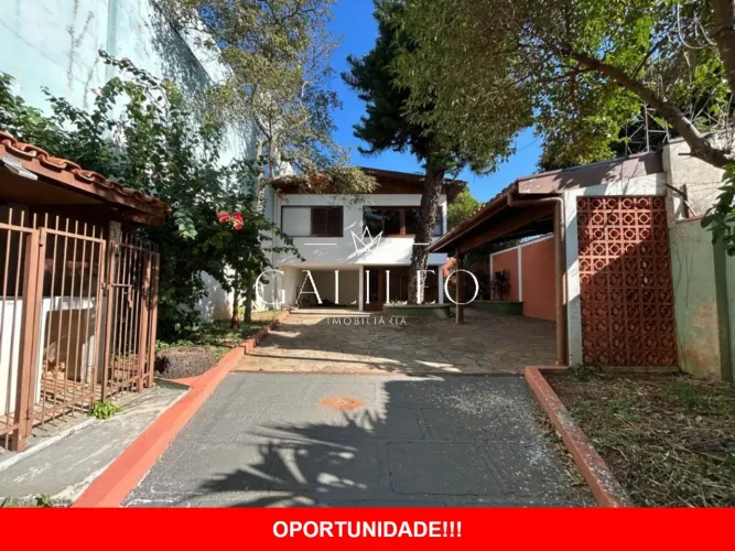 VENDE-SE CASA COM 04 DORMITÓRIOS, 02 SUÍTES, COM CHURRASQUEIRA E PORTÃO ELETRÔNICO, POTENC