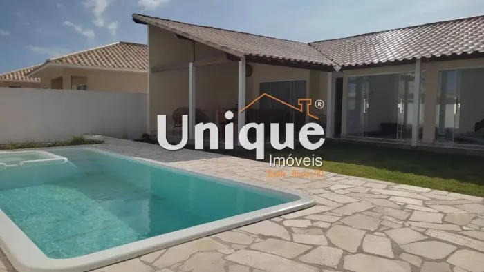 Casa com piscina e 4 quartos na Praia Linda, à venda por R$ 600.000,00.