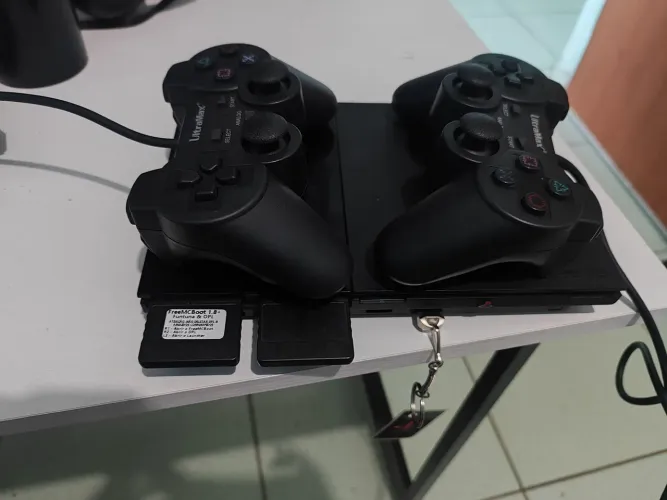 PS2 slim com pen drive com 120 jogos