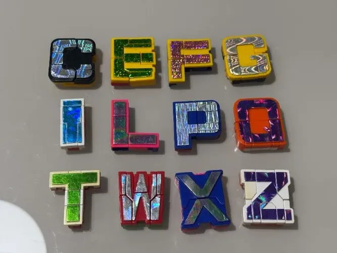 Coleção Letronix - Revista Recreio - 12 Letras Holográficas Originais