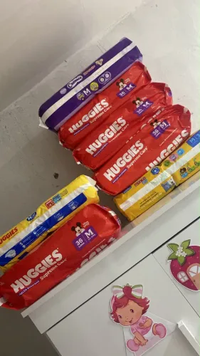 Fraldas Huggies e Cremer 