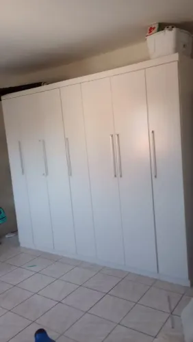 Guarda roupas 7 portas e 4 gavetas