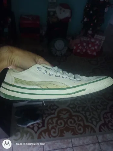 PAR DE TÊNIS MASCULINO PUMA ORIGINAL ESTILO CHUTEIRA. 