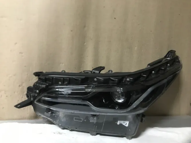Farol Hilux Sw4  esquerdo motorista 