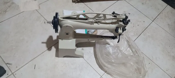 Máquina costura remendo 