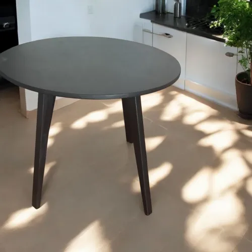 Mesa de jantar redonda preta