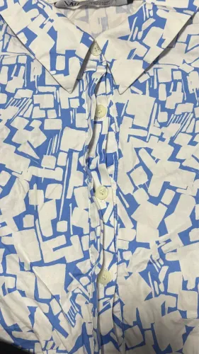 Blusa de botões mangabufante, Zara, trazida do Estados Unidos