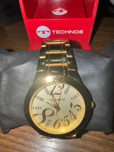 relógio feminino Technos dourado