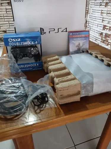 Playstation 4 slim 1 tb de memória na caixa