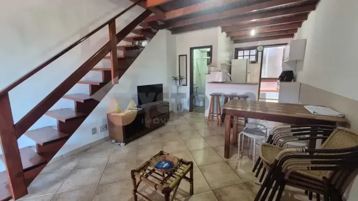 Flat com 2 dormitórios à venda, 58 m² por R$ 355.000 - Prainha - Caraguatatuba/SP