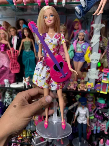 Boneca barbie quero ser professora de musica