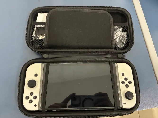 Vendo Nintendo Switch Oled NOVO