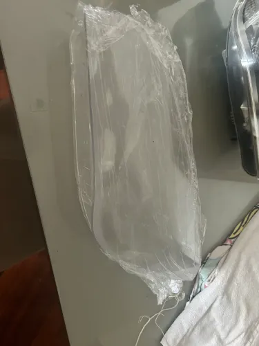 Mica do Farol Esquerdo (motorista) BMW X1 2015 Original