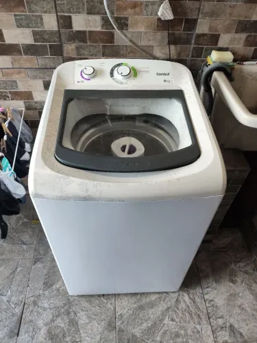 Máquina de lavar com defeito