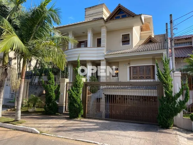 Sobrado de 525m² para Locação com 4 Suítes no Bairro Bela Vista Canoas