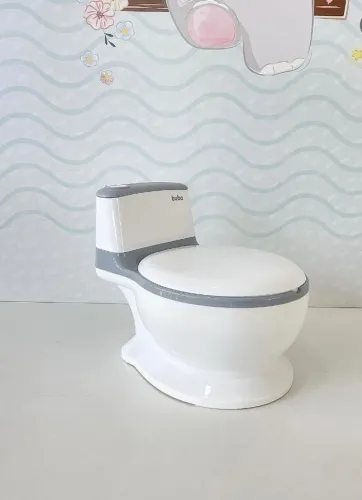 Penico infantil da marca buba, com som de descarga