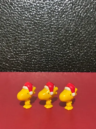 Boneco miniatura - Woodstock (cada um 30)