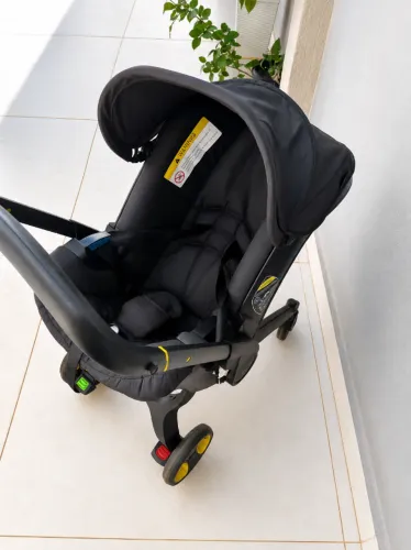Bebê Conforto com rodinha / Carrinho de Bebê - carrinho de bebê doona
