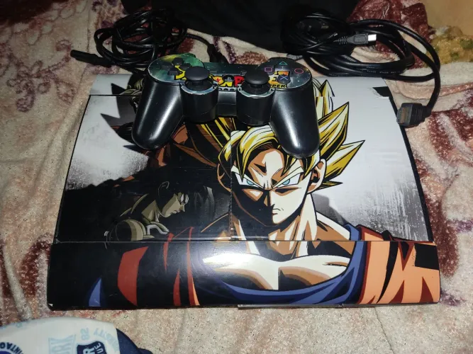 Vendo ps3 desbloqueado 1 controle todos os cabos com vários jogos.