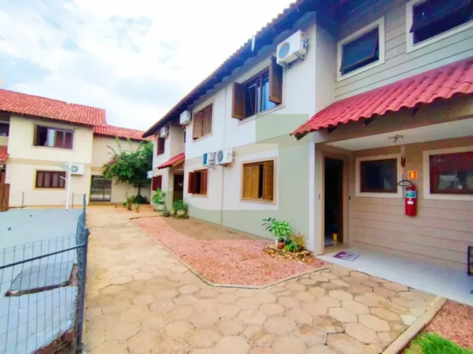 Casa em condomínio para locação e venda no bairro Scharlau em São Leopoldo