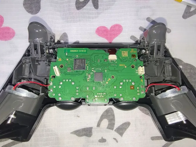 Placa controle PS4 com defeito capacitor da placa em curto, boa pra técnico arrumar