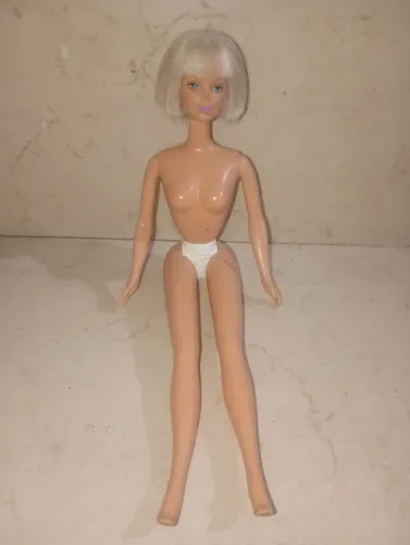 Boneca Barbie piloto cabelo curto 