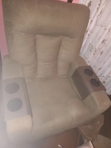 Relaxe seu corpo e pes na poltrona reclinavel