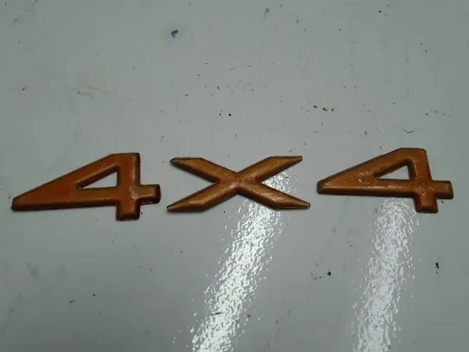 13176 Emblema 4x4 Traseira Direita Jeep Grand Cherokee 1996 a 1998.