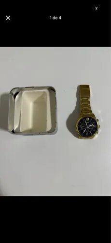 Relógio fóssil dourado 