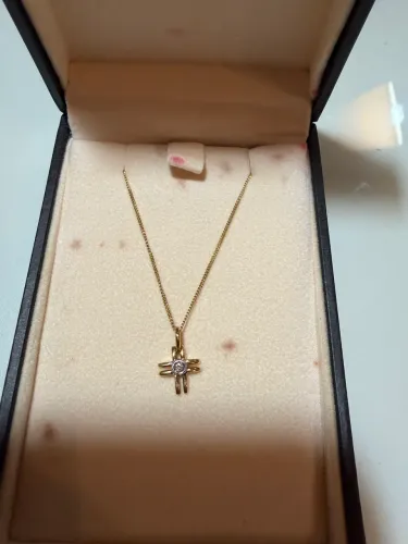 Cordão com pendente e brilhante em ouro H.Stern