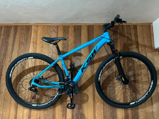 Bicicleta aro 29 freios a disco alumínio nova com NF