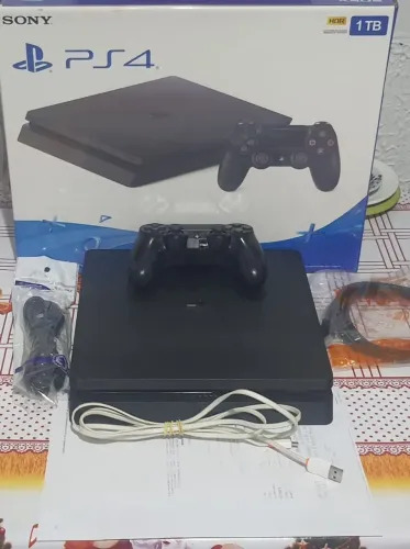 Ps4 slim 1 terá 1 controle 50 jogos com fifa 26 e pes 26