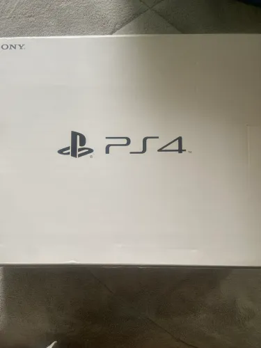 Ps4 - PlayStation 4 com um controle