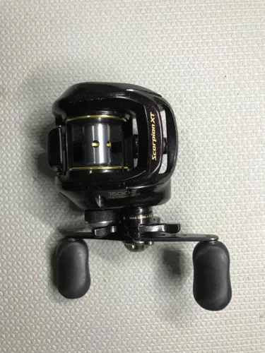 Carretilha Shimano Scorpion XT 1500-7 manivela direita