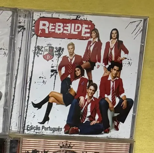 CD REBELDE Edição Português - RBD ( RELANÇAMENTO)