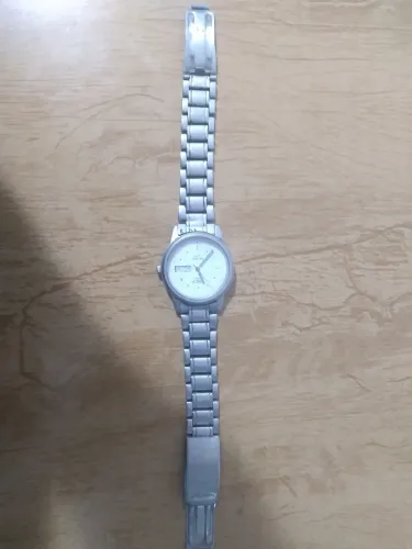 Relogio metal prata, não funciona