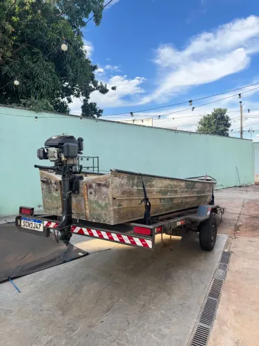Barco Canoa bico fino 6m borda alta + motor + carreta 