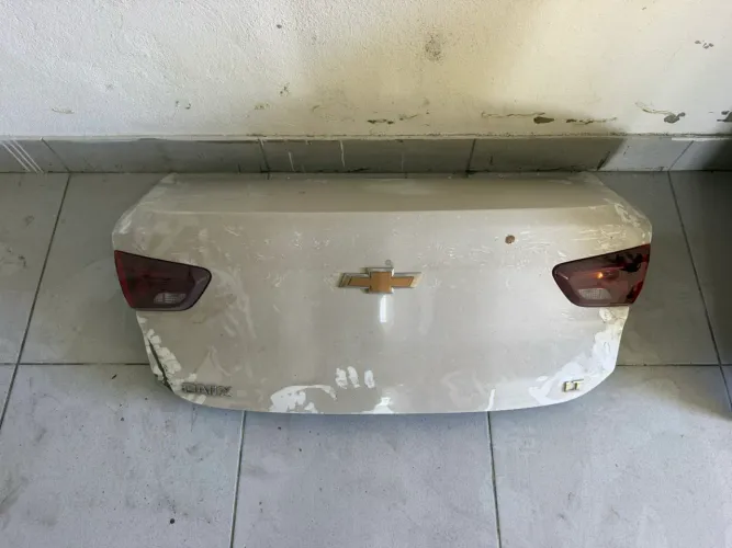 TAMPA TRASEIRA ONIX 2024 SEDAN