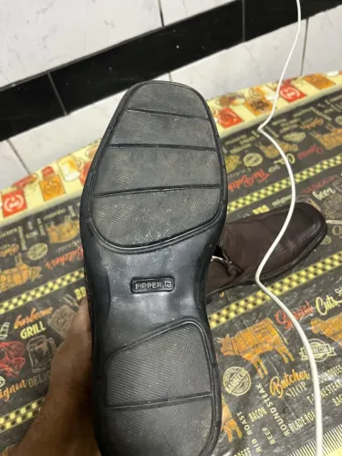 Bota em couro
